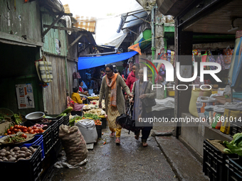 People are being seen in a vegetable market in Darjeeling, India, on July 2, 2024. Darjeeling is being known as a famous tourist destination...