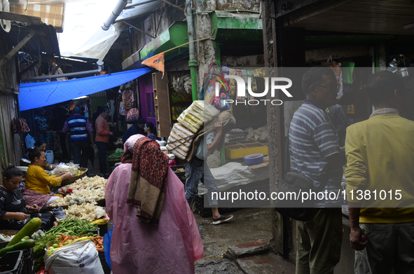 People are being seen in a vegetable market in Darjeeling, India, on July 2, 2024. Darjeeling is being known as a famous tourist destination...