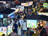 Citizens are enjoying food and leisure time at a night market in Nanjing, China, on July 3, 2024. (