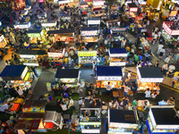 Citizens are enjoying food and leisure time at a night market in Nanjing, China, on July 3, 2024. (