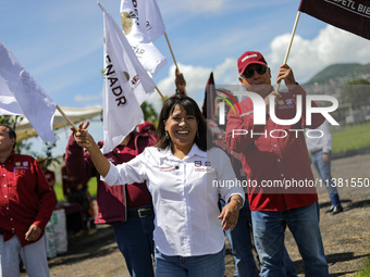 Engineer Columba Lopez Gutierrez, Director of Natural Resources and Rural Development (CORENADR), is giving the starting signal for the ''Gr...