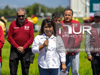 Engineer Columba Lopez Gutierrez, Director of Natural Resources and Rural Development (CORENADR), is giving the starting signal for the ''Gr...