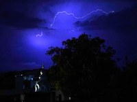 Lightning is flashing through the sky over Ajmer during the monsoon showers in Ajmer, Rajasthan, India, on July 4, 2024. (