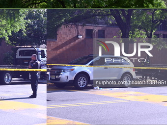 A vehicle is being damaged as a result of the shooting at the crime scene. Two people are being shot in Paterson, New Jersey, United States,...