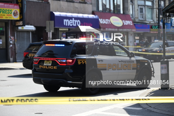 Paterson police are investigating the crime scene. Two people are being shot in Paterson, New Jersey, United States, on July 3, 2024, Wednes...