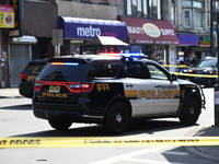 Paterson police are investigating the crime scene. Two people are being shot in Paterson, New Jersey, United States, on July 3, 2024, Wednes...