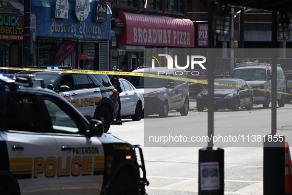 Paterson police are investigating the crime scene. Two people are being shot in Paterson, New Jersey, United States, on July 3, 2024, Wednes...