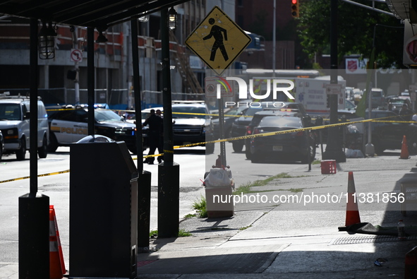 Paterson police are investigating the crime scene. Two people are being shot in Paterson, New Jersey, United States, on July 3, 2024, Wednes...