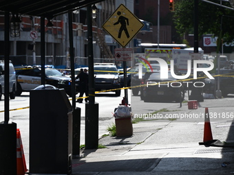 Paterson police are investigating the crime scene. Two people are being shot in Paterson, New Jersey, United States, on July 3, 2024, Wednes...