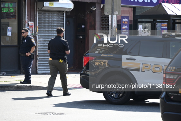 Paterson police are investigating the crime scene. Two people are being shot in Paterson, New Jersey, United States, on July 3, 2024, Wednes...