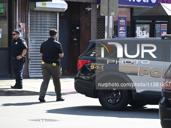 Paterson police are investigating the crime scene. Two people are being shot in Paterson, New Jersey, United States, on July 3, 2024, Wednes...