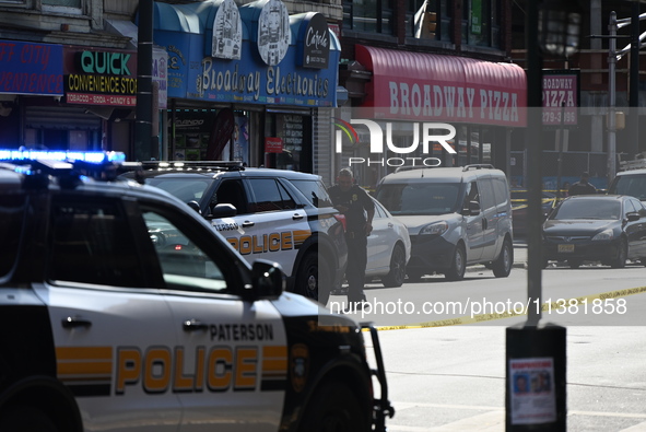 Paterson police are investigating the crime scene. Two people are being shot in Paterson, New Jersey, United States, on July 3, 2024, Wednes...