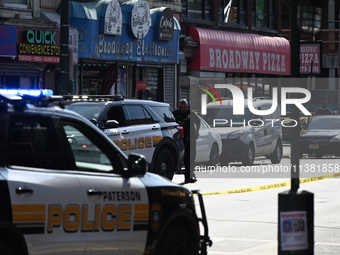 Paterson police are investigating the crime scene. Two people are being shot in Paterson, New Jersey, United States, on July 3, 2024, Wednes...