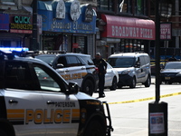 Paterson police are investigating the crime scene. Two people are being shot in Paterson, New Jersey, United States, on July 3, 2024, Wednes...