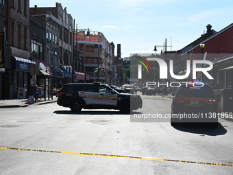 Paterson police are investigating the crime scene. Two people are being shot in Paterson, New Jersey, United States, on July 3, 2024, Wednes...