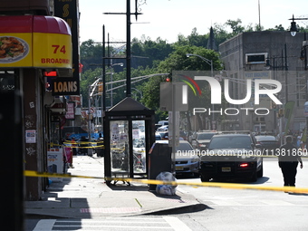 Paterson police are investigating the crime scene. Two people are being shot in Paterson, New Jersey, United States, on July 3, 2024, Wednes...