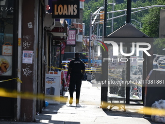 Paterson police are investigating the crime scene. Two people are being shot in Paterson, New Jersey, United States, on July 3, 2024, Wednes...