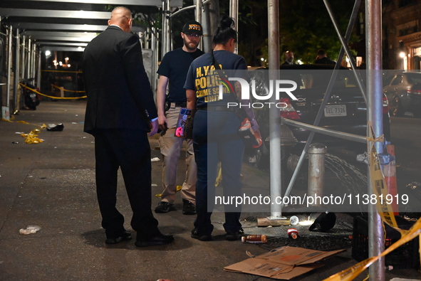 The New York City Police Department Crime Scene Unit and detectives are investigating the incident in Bronx, New York, United States, on Jul...