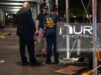 The New York City Police Department Crime Scene Unit and detectives are investigating the incident in Bronx, New York, United States, on Jul...