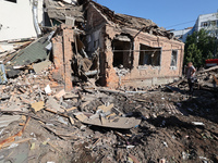 A building in a residential area is being destroyed by the Russian glide bomb attack in Kharkiv, Ukraine, on July 3, 2024. At about 4 pm on...