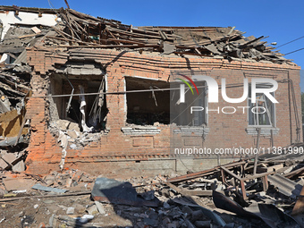 A building in a residential area is being destroyed by the Russian glide bomb attack in Kharkiv, Ukraine, on July 3, 2024. At about 4 pm on...