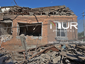 A building in a residential area is being destroyed by the Russian glide bomb attack in Kharkiv, Ukraine, on July 3, 2024. At about 4 pm on...