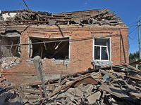 A building in a residential area is being destroyed by the Russian glide bomb attack in Kharkiv, Ukraine, on July 3, 2024. At about 4 pm on...