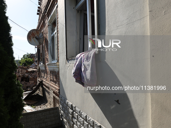 A building in a residential area is being destroyed by the Russian glide bomb attack in Kharkiv, Ukraine, on July 3, 2024. At about 4 pm on...