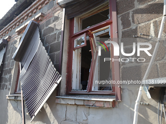 A broken window is in a house destroyed by the Russian glide bomb attack in Kharkiv, Ukraine, on July 3, 2024. At about 4 pm on Wednesday, J...