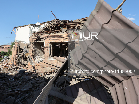 A building in a residential area is being destroyed by the Russian glide bomb attack in Kharkiv, Ukraine, on July 3, 2024. At about 4 pm on...