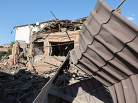 A building in a residential area is being destroyed by the Russian glide bomb attack in Kharkiv, Ukraine, on July 3, 2024. At about 4 pm on...