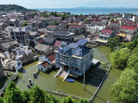 The water level of Shijiu Lake is rising after days of rainstorm, and some surrounding villages are flooding in Nanjing, China, on July 4, 2...