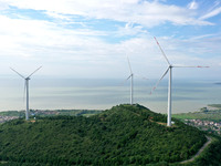 Wind turbines are operating at Chaohu Guanhu Wind Farm in Hualin town, Chaohu city, Anhui province, China, on July 3, 2024. (