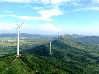 Wind turbines are operating at Chaohu Guanhu Wind Farm in Hualin town, Chaohu city, Anhui province, China, on July 3, 2024. (