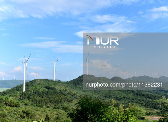 Wind turbines are operating at Chaohu Guanhu Wind Farm in Hualin town, Chaohu city, Anhui province, China, on July 3, 2024. 