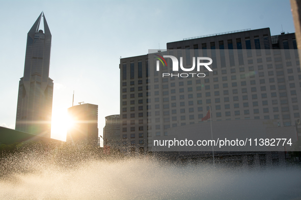 A water fountain from the People's Square is being seen in Shanghai, China, on July 4, 2024, as the temperature is reaching 39 degrees Celsi...