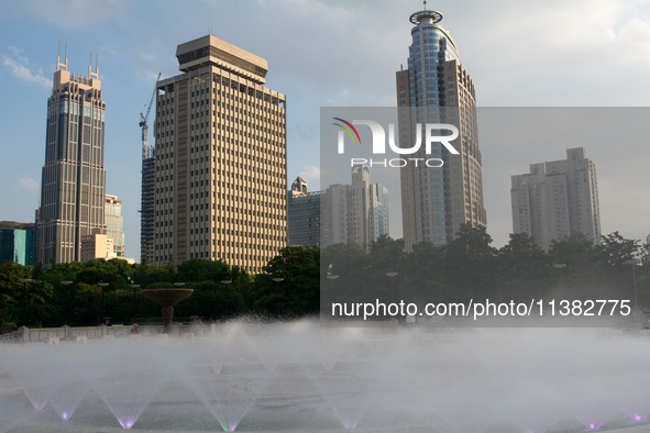 A water fountain from the People's Square is being seen in Shanghai, China, on July 4, 2024, as the temperature is reaching 39 degrees Celsi...