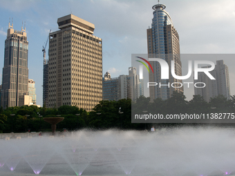 A water fountain from the People's Square is being seen in Shanghai, China, on July 4, 2024, as the temperature is reaching 39 degrees Celsi...