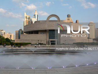 A water fountain from the People's Square is being seen in Shanghai, China, on July 4, 2024, as the temperature is reaching 39 degrees Celsi...