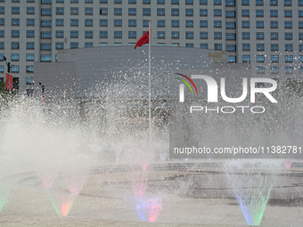 A water fountain from the People's Square is being seen in Shanghai, China, on July 4, 2024, as the temperature is reaching 39 degrees Celsi...