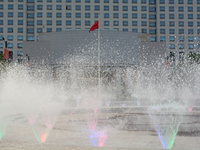 A water fountain from the People's Square is being seen in Shanghai, China, on July 4, 2024, as the temperature is reaching 39 degrees Celsi...