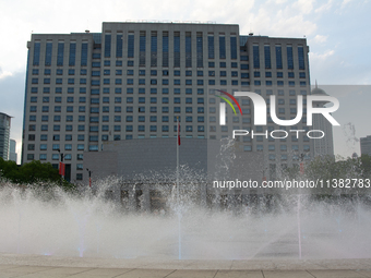 A water fountain from the People's Square is being seen in Shanghai, China, on July 4, 2024, as the temperature is reaching 39 degrees Celsi...