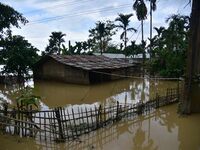 A partially submerged hut is being seen after heavy rainfall in Hojai District of Assam, India, on July 5, 2024. (