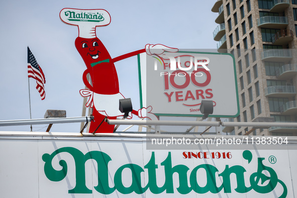 Nathan's Famous Hot Dogs restaurant at Coney Island in New York, United States on America on July 4th, 2024.
 