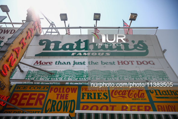 Nathan's Famous Hot Dogs restaurant at Coney Island in New York, United States on America on July 4th, 2024.
 