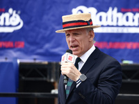 George Shea hosts Nathan's Famous Hot Dogs Eating Contest which takes place annually at Coney Island on Independence Day in New York, United...