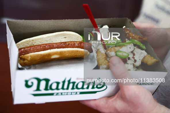 A box with a hot dog is seen during Nathan's Famous Hot Dogs Eating Contest which takes place annually at Coney Island on Independence Day i...