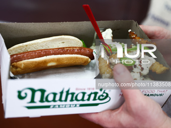 A box with a hot dog is seen during Nathan's Famous Hot Dogs Eating Contest which takes place annually at Coney Island on Independence Day i...