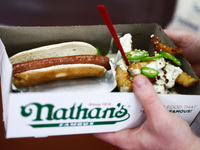 A box with a hot dog is seen during Nathan's Famous Hot Dogs Eating Contest which takes place annually at Coney Island on Independence Day i...