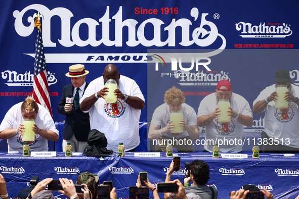 Contestants attend lemonade drinking contest during Nathan's Famous Hot Dogs Eating Contest which takes place annually at Coney Island on In...